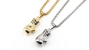 Detail of 3D boxing glove pendants in gold and silver finish with sturdy box chains