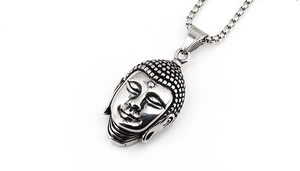 Detail of Buddha head pendant featuring vintage relief carving and stainless steel box chain
