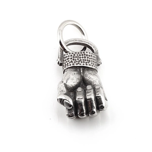 Retro titanium steel fist pendant necklace with honeycomb texture on a white background