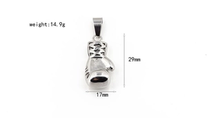 Detailed view of 3D boxing glove pendant in polished steel with size and weight metrics