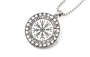Detailed macro view of Viking compass pendant with Valhalla inscription and Runes text