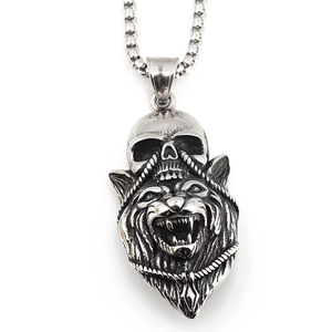 Retro steel punk necklace featuring a detailed skull and wolf head pendant with box chain