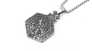 Close-up of Viking Vegvisir compass pendant with Nordic runes on a stainless steel chain