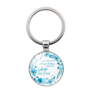 Detailed macro view of silver keychain with Psalm 91:4 verse and blue floral pattern