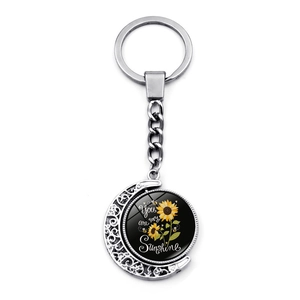 Silver crescent moon keychain with You Are My Sunshine sunflower glass pendant