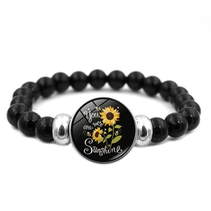 Bracciale You Are My Sunshine con perline nere e ciondolo di girasole per le donne