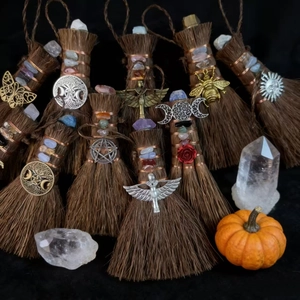 Mini Wicca witch brooms with natural crystals and bronze charms for altar decoration