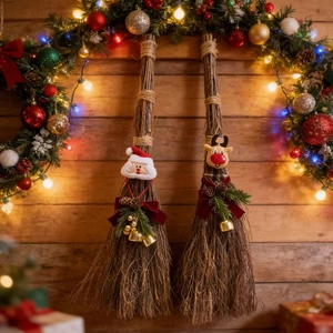 Detail of Christmas broom set with plush Santa and Reindeer heads, pine cones and bells