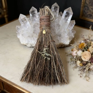 Handmade decorative witch broom with crystal stone and vintage metal pendant for altar decor