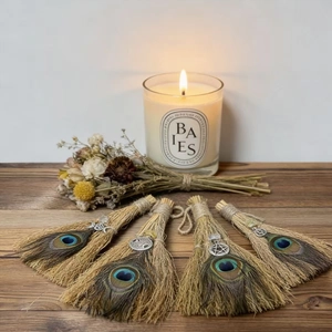 Set of four handmade witch besom brooms with peacock feathers and mystic charms