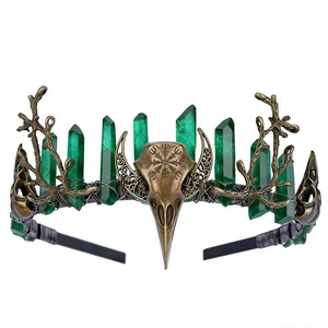 Gothic crown with green crystals, bronze bird skull, and Viking Vegvisir symbol