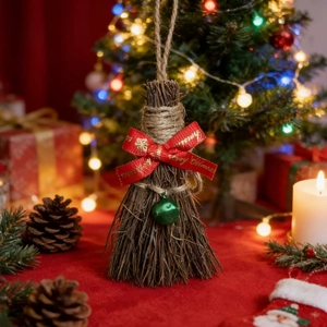 Handcrafted Christmas broom ornament with red Merry Christmas ribbon and green bell
