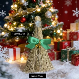 Christmas broom ornament with green bow and gold bell, measures 15cm height