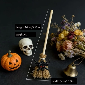 Mini Halloween witch broom decoration with black skull charm and wood handle, 14cm length