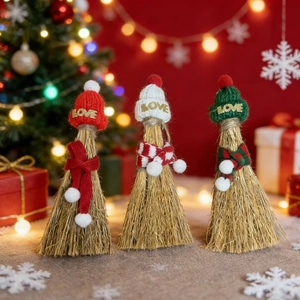 Miniature Christmas straw brooms with colorful knit hats and love gold lettering
