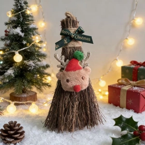 Detail of Christmas broom with plush reindeer head, glitter horns and Merry Christmas ribbon