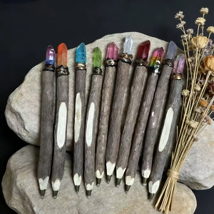 Set of 11 eco-friendly wooden ballpoint pens with various colorful natural crystal toppers