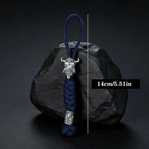 Handmade woven paracord keychain with silver Spartan skull bead in a 14cm length