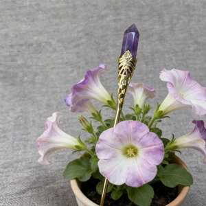 Vintage gold hair pin with hexagonal purple crystal pillar and floral carvings