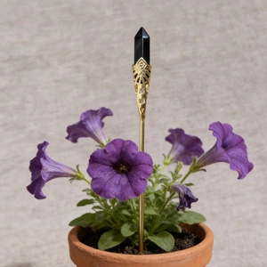 Handmade hexagonal black crystal wand with vintage gold filigree in purple flower pot