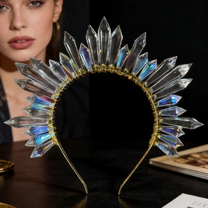 Macro detail of iridescent crystal crown showing fine gold wire wrapping craftsmanship