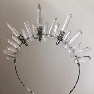 Handmade boho crown with raw white crystal points on a silver metallic headband base