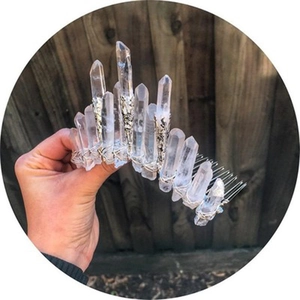 Handmade quartz crystal hair comb featuring clear natural stone pillars on a metal base