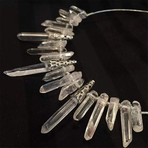 Detailed close-up of natural white crystal crown featuring vintage silver metal filigree caps