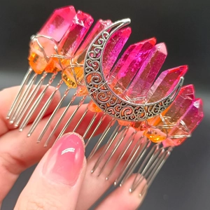 Detail of pink crystal moon hair comb with hand-wrapped silver wire for wicca style