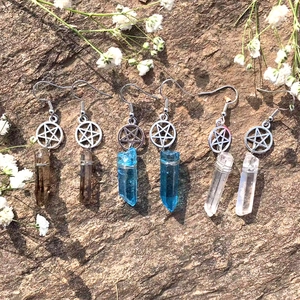 Bohemian pentagram crystal drop earrings in smoke, blue, and clear colors with silver hooks