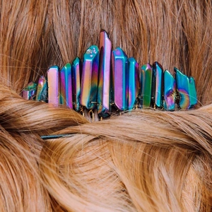 Detail of wicca moon crystal hair comb with rainbow blue and purple raw quartz stones