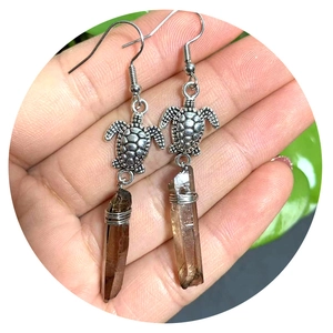 Bohemian silver sea turtle earrings featuring natural brown crystal wire-wrapped pendants