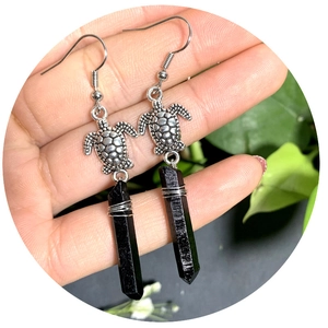 Bohemian silver turtle earrings featuring black crystal charms and handmade fishhook design