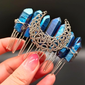 Macro shot of blue raw crystal hair comb with silver hollow crescent moon detail