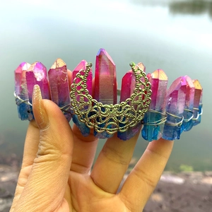 Detailed view of handmade rainbow crystal crown with silver crescent moon and wires