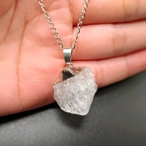 Natural white crystal raw stone pendant necklace with a delicate silver curb chain