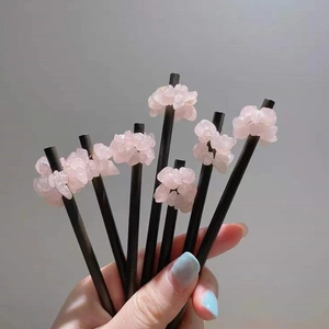 Black wooden hair pin with rose quartz chips and minimalist bohemian crystal design