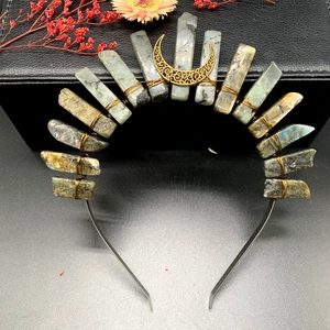 Detailed shot of handmade moon crown featuring labradorite crystals and gold moon charm