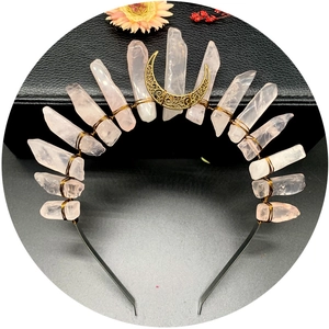 Handmade moon crown headband featuring natural raw pink quartz crystals and gold crescent