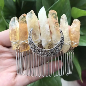 Detail of bohemian moon hair comb with handmade wire-wrapped natural crystal stones