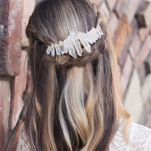 Handmade bohemian crown with natural white quartz crystals on a metal hair comb base