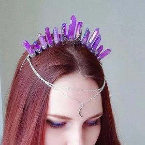 Detail of bohemian crown featuring purple crystal points and silver crescent moon pendant