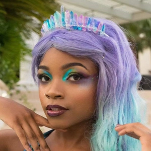 Detail of handcrafted mermaid crystal crown with iridescent purple and blue raw stones