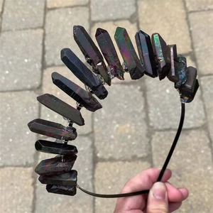 Detail of gothic iridescent black crystal crown with handcrafted wire-wrapping on metal headband