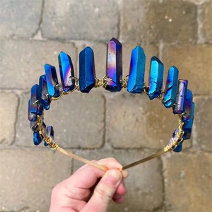 Close-up of handmade gold crown headband with deep blue electroplated raw quartz crystals
