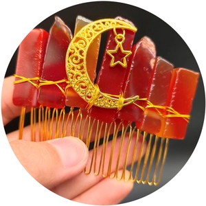 Handmade bohemian hair comb with red crystal quartz shards and golden moon star accents
