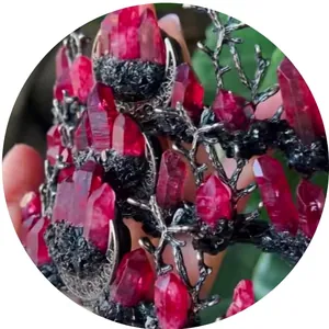 Handmade Gothic headpiece with raw red crystal stones on black branch-shaped metal base