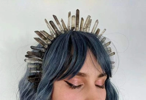 Detailed close-up of natural smoky quartz raw crystal points on a gothic bridal headband
