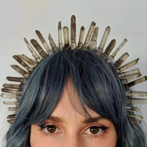 Handmade brown raw crystal crown headpiece worn on wavy hair for bridal party decoration