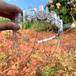 Detailed view of bohemian crystal crown with crescent moons and triple hanging chains